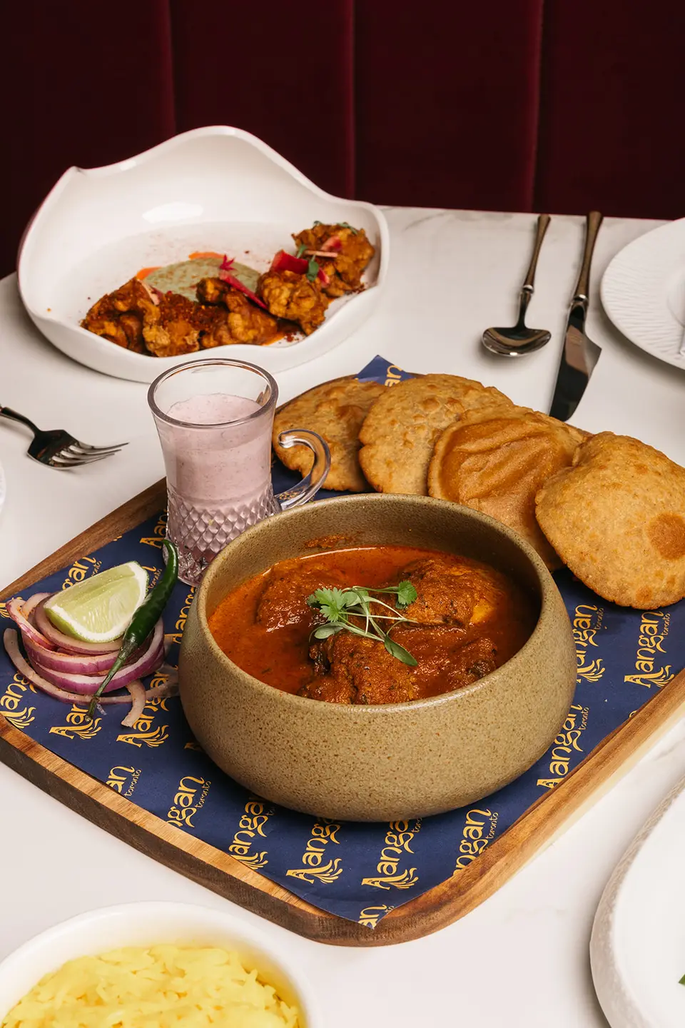 Signature Aangan Toronto dish plated for service